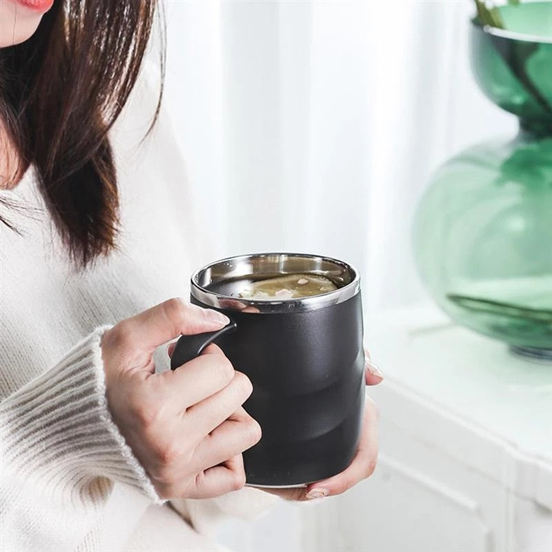 Insulated camp mug with handle and sliding lid